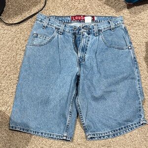 This is a vintage Levi's SilverTab loose-fit denim shorts.